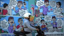 Dinding di Kampung Joho Solo Dipenuhi Mural Komik Anti-hoaks