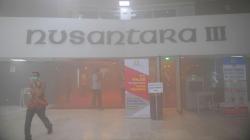 Penampakan Gedung Nusantara III DPR Tertutup Kepulan Asap