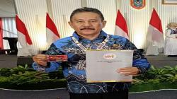 Di HPN 2025, Wartawan Senior Naek Pangaribuan Dianugerahi PCNO