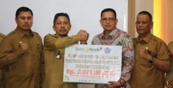 Pemkab Terima Rp2,47 Miliar dari Bank Aceh, Bupati Dorong Dana Dividen dan Zakat Pacu Ekonomi Rakyat