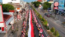 Simbol Kejayaan Bangsa, Kirab Bendera Merah Putih Berlangsung Khidmat di Aceh