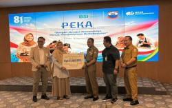 Ditinggal Tulang Punggung Keluarga,  Ahli Waris Petugas Linmas Terima Santunan Program PEKA