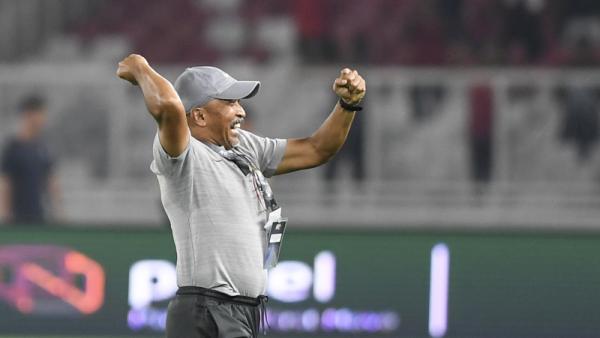 Pelatih Timnas Indonesia U-19 Fakhri Husaini merayakan sukses skuatnya lolos ke Piala Asia U-19 2020.