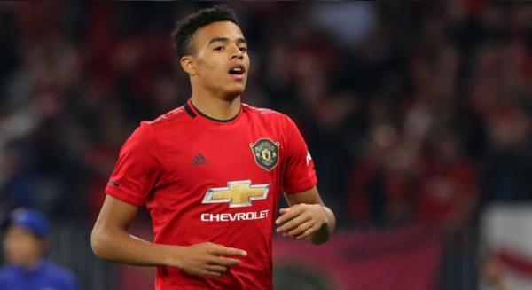 Mason Greenwood 1 Penyerang Manchester United Mason Greenwood merayakan gol yang dibuatnya saat bermain imbang 1-1 melawan Everton, Minggu (15/12/2019). (Foto: AFP)