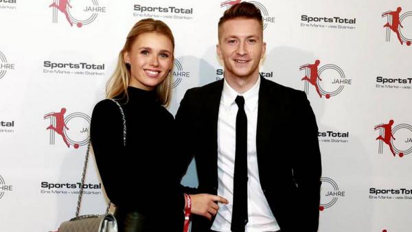 Marco Reus dengan istrinya, Scarlett Gartmann. (Foto: gala.de)