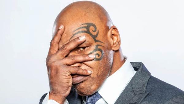 Tato tribal di wajah Tyson. (Foto: The Sun)