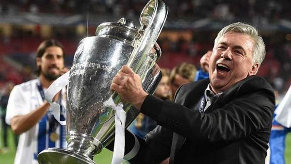 Carlo Ancelotti sukses meraih trofi Liga Champions bersama Real Madrid, setelah sebelumnya mengantar AC Milan dua kali juara di ajang ini. (Foto: UEFA)