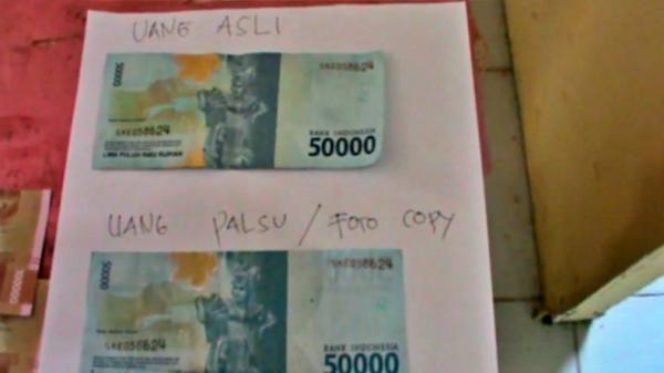 Uang palsu-1 Ilustrasi uang palsu (Widori Agustino/iNews)