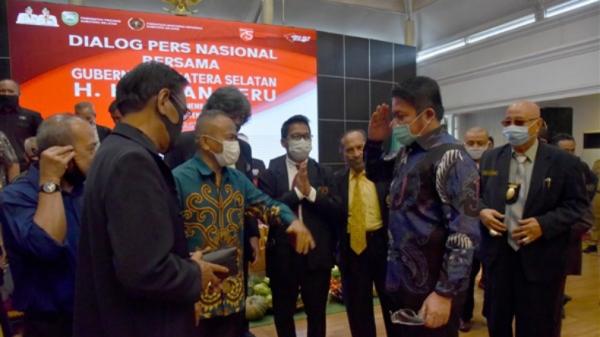 Gubernur Sumatera Selatan Herman Deru dan Ketua PWI Pusat Attal S Depari (Humas Pemprov Sumsel)