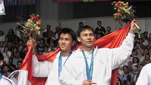 Tony Gunawan/Candra Wijaya – Olimpiade Sydney 2000 Tony Gunawan/Candra Wijaya – Olimpiade Sydney 2000 (Foto: AFP)