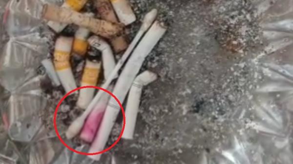 MAYAT TASIKMALAYA1.JPG Puntung rokok bernoda lisptik ditemukan di asbak dalam kamar korban. (Foto: iNewsTv/Asep Juhariyono)