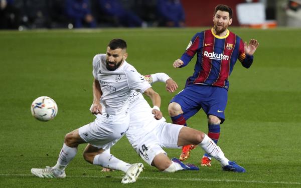 Lionel Messi Barcelona menghajar Huesca 4-1 di Camp Nou pada jornada ke-27 Liga Spanyol, Selasa (16/3/2021) dini hari WIB. Kapten Blaugrana Lionel Messi mengukir dua rekor. (Foto: Reuters)