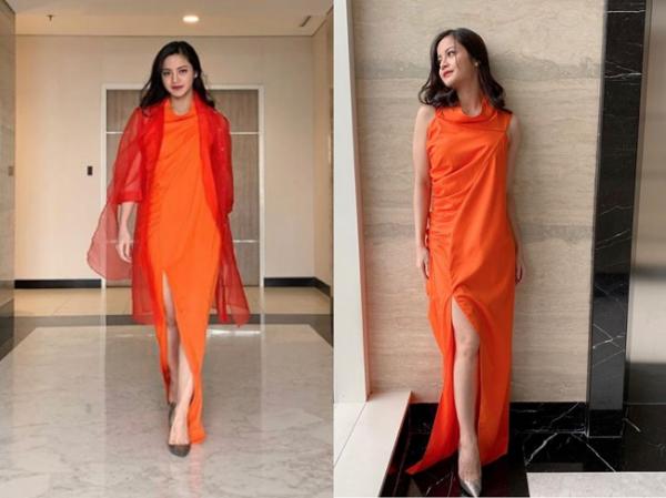Ovi Dian 3 Presenter Ovi Dian tampil cerah dengan dress warna oranye. (Foto: IG)