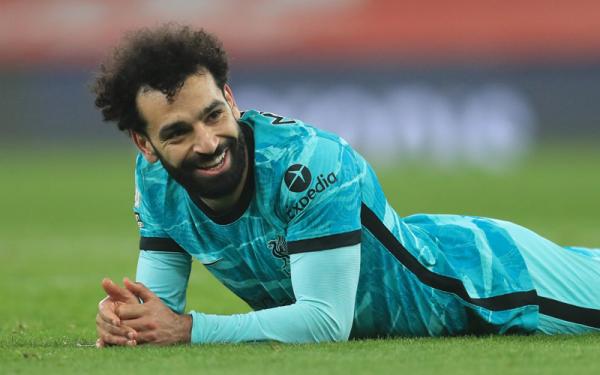 Mohamed Salah Winger Liverpool Mohamed Salah lebih hebat dari Thiery Henry usai menyumbang gol dalam kemenangan 3-0 atas Arsenal, Minggu (4/4/2021) dini hari WIB. (Foto: Reuters)