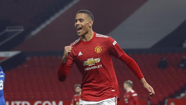 Striker muda Manchester United Mason Greenwood Striker muda Manchester United Mason Greenwood merayakan golnya ke gawang Brighton & Hove Albion pada lanjutan Liga Inggris 2020/2021 di Old Trafford, Senin (5/4/2021) dini hari WIB. (Foto: REUTERS)