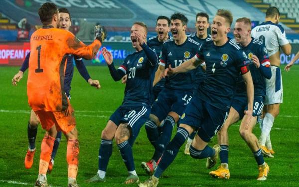 Timnas Skotlandia 1 Timnas Skotlandia merayakan kelolosan ke Euro 2020 (Foto: BBC)