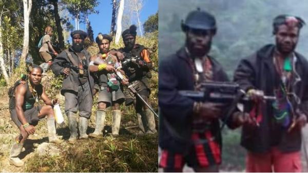 Anggota KKB Mairon Tabuni bergaya angkat senjata. (Foto: Istimewa).