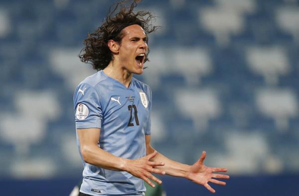 Edinson Cavani Gol Edinson Cavani membantu Uruguay kalahkan Bolivia 1-0 pada matchday ketiga Grup A Copa America 2021 di Arena Pantanal, Jumat (25/6/2021) pagi WIB. (Foto: Reuters)
