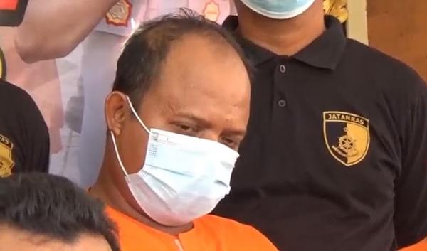 I Wayan Sadia (39), pelaku utama yang menebas Gede Budiarsana hingga tewas. (Foto: iNews.id/Aris Wiyanto)