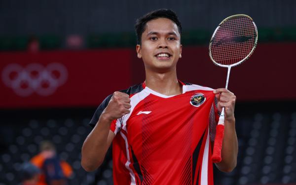 Anthony Sinisuka Ginting Pebulu tangkis Indonesia, Anthony Sinisuka Ginting, semringah seusai mengalahkan wakil Jepang, Kanta Tsuneyama, dalam ajang Olimpiade Tokyo 2020 di Musashino Forest Sport Plaza pada Kamis (29/7/2021). (Foto: REUTERS/Leonhard Foeger)