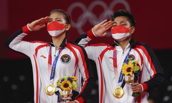 Greysia/Apriyani 9 Ganda putri Greysia Polii/Apriyani Rahayu meraih medali emas Olimpiade Tokyo 2020. Dia mengucapkan terima kasih ke rakyat Indonesia. (Foto: Reuters)