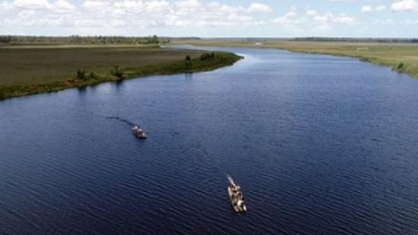 Tempat Wisata di Merauke Papua salah satunya Danau Rawa Biru. (Foto: ist)