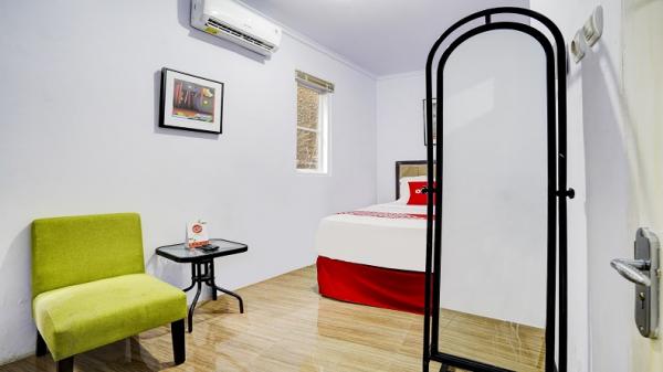 AR20 GUEST HOUSE Kamar yang bersih dan modern di AR20 Guest House. (Foto: OYO)