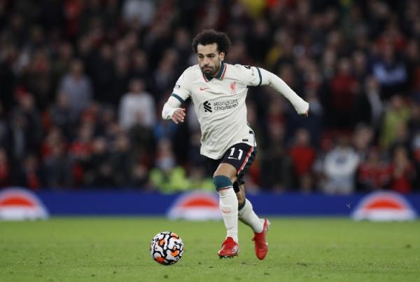 Liverpool pesta gol 5-0 ke gawang Manchester United laga lanjutan Liga Inggris 2021-2022. Striker Liverpool Mohamed Salah menjadi bintang dengan 3 gol. (foto: REUTERS).