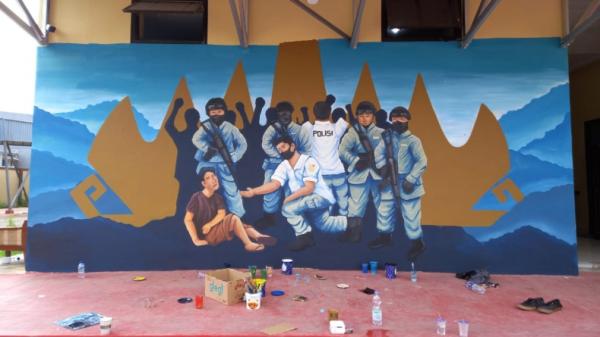 Mural hari Pahlawan di Polda Lampung Direktorat Reserse Kriminal Umum Polda Lampung mengundang para seniman mural muda berbakat di hari pahlawan (Istimewa)