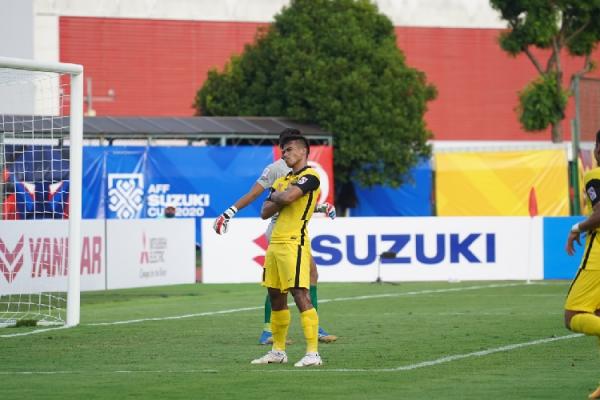 Safawi Rasid menjadi bintang kemenangan Timnas Malaysia 4-0 atas Laos di babak penyisihan Grup B Piala AFF 2020. Safawi Rasid mencetak hattrick. (foto: AFFSuzukicup.com).