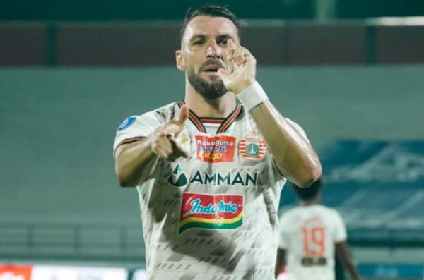 Striker Persija Jakarta, Marko Simic Striker Persija Jakarta, Marko Simic merayakan gol ke gawang PSIS Semarang dalam laga Liga 1 2021/2022 di Stadion I Wayan Dipta, Gianyar, Bali, Kamis (6/1/2022). (Foto: Instagram/@Persija_Jkt)