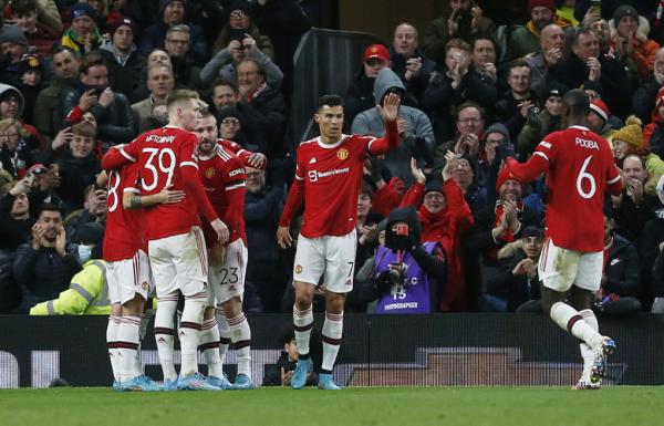 Manchester United rayakan gol Jadon Sancho Pemain Manchester United merayakan gol Jadon Sancho ke gawang Middlesbrough dalam laga Piala FA 2021/2022 di Stadion Old Trafford, Sabtu (5/2/2022). (Foto: REUTERS/Craig Brough)