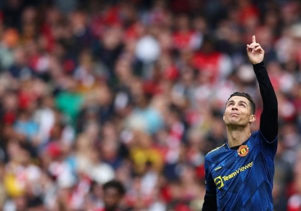 Cristiano Ronaldo Striker Manchester United, Cristiano Ronaldo merayakan gol ke gawang Arsenal dalam laga Liga Inggris 2021/2022 di Stadion Emirates, London, Sabtu (23/4/2022). (Foto: REUTERS)