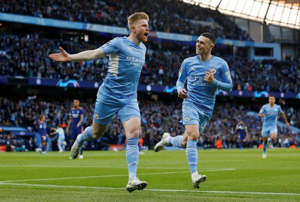 Man City vs Real madrid De Bruyne Kevin De Bruyne mencetak gol cepat ke gawang Real Madrid dalam laga leg pertama semifinal Liga Champions 2021/2022. Gol De Bruyne itu jadi tercepat di semifinal (foto: REUTERS/Craig Brough).