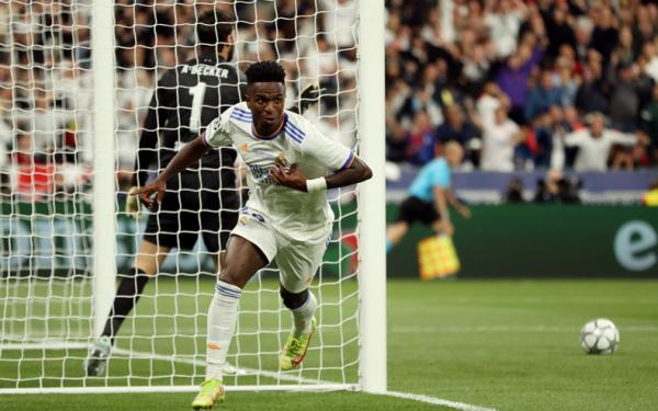 Vinicius Junior Real Madrid juara Liga Champions 2021/2022 usai kalahkan Liverpool 1-0 pada partai final di Stade de France, Minggu (29/2/2022) dini hari WIB. (Foto: REUTERS/Molly Darlington)