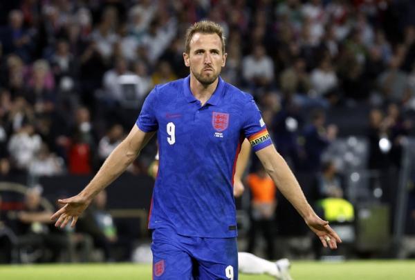 Kapten Timnas Inggris, Harry Kane Striker sekaligus kapten Timnas Inggris, Harry Kane merayakan gol ke gawang Jerman dalam laga UEFA Nations League di Allianz Arena, Munchen, Rabu (8/6/2022). (Foto: REUTERS)