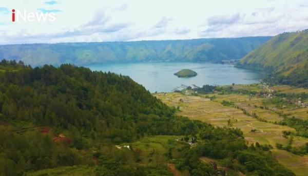 Desa Wisata Tipang di sisi Danau Toba Desa Wisata Tipang, surga tersembunyi di sisi Danau Toba. (Foto: iNews)