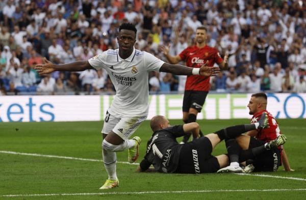 Vinicius Junior Striker Real Madrid, Vinicius Junior merayakan gol ke gawang Real Mallorca dalam laga Liga Spanyol 2022/2023 di Stadion Santiago Bernabeu, Madrid, Minggu (11/9/2022). (Foto: REUTERS)