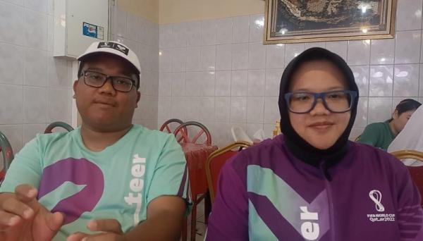 Andi Ronaldo dan Mita Yulian Sasmita senang bisa menjadi volunteer Piala Dunia 2022. (Foto: MNC Portal Indonesia/Abdul Haris)