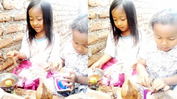 Anak perempuan bermain anjang-anjangan. (FOTO: iNews.id/AGUS WARSUDI)