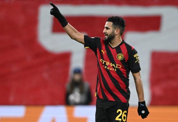 Riyad Mahrez Winger Manchester City, Riyad Mahrez merayakan gol ke gawang RB Leipzig pada laga Liga Champions 2022/2023 di Stadion Red Bull Arena, Kamis (23/2/2023). (Foto: REUTERS)