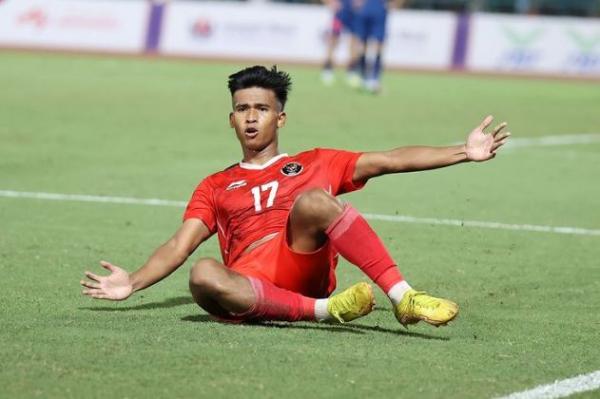Striker Timnas Indonesia U-22 Irfan Jauhari Striker Timnas Indonesia U-22 Irfan Jauhari merayakan gol ke gawang Thailand U-22 pada final SEA Games 2023, Selasa (16/5/2023) malam WIB. (Foto: RCTI+)