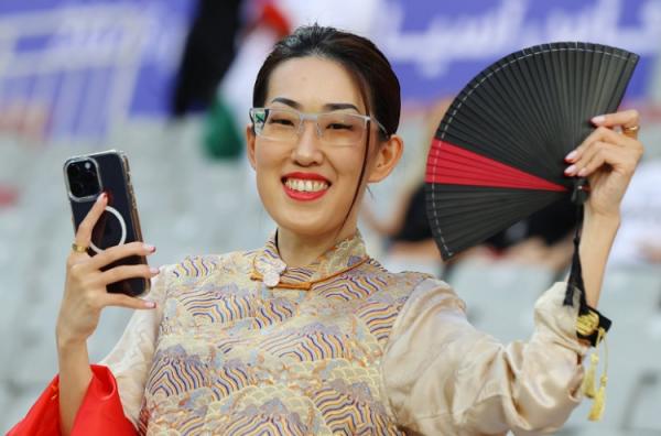 Suporter China Foto: Gulf Times