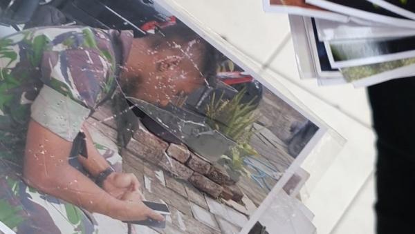 Foto di Rumah Terduga Dukun Santet Berikut penampakan foto-foto ditusuk jarum dan dicoret tinta merah yang ditemukan di rumah terduga dukun santet di Tangsel. (Foto: Hambali)