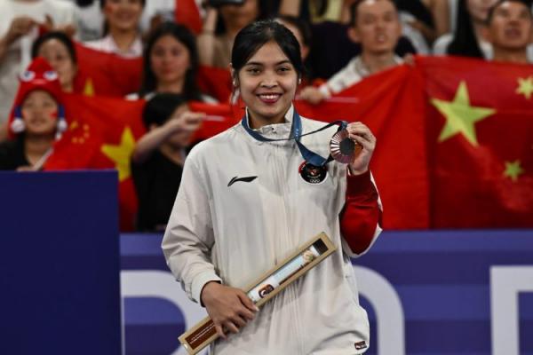 Gregoria Mariska Tunjung perunggu Tunggal putri Indonesia, Gregoria Mariska Tunjung, meraih medali emas cabang olahraga bulu tangkis Olimpiade Paris 2024, Senin (5/8/2024).