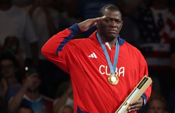 Pegulat Kuba Mijain Lopez 2 Pegulat Kuba Mijain Lopez meraih medali emas Olimpiade Paris 2024, Rabu (7/8/2024). (Foto: EPA)