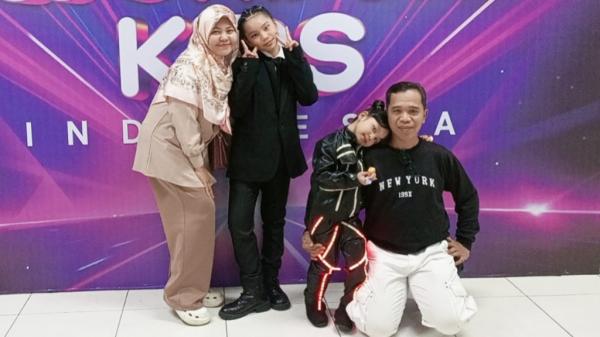 Evelyn dan keluarganya. Evelyn dan keluarganya. (Foto: Istimewa)
