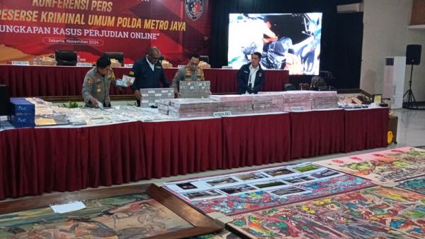 Uang Kasus Judi Online Komdigi Uang Rp76 miliar yang disita Polda Metro Jaya terkait kasus judi online Komdigi. (Foto: Irfan Ma`ruf)