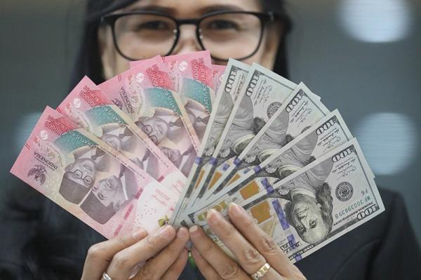 Rupiah Dibuka Melemah usai Gubernur BI Mundur, Tembus Rp18.091 per Dolar AS