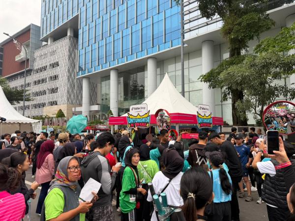 CFD Lapangan Merdeka Medan Dipadati Warga, Payung hingga Mystery Box Bikin Penasaran